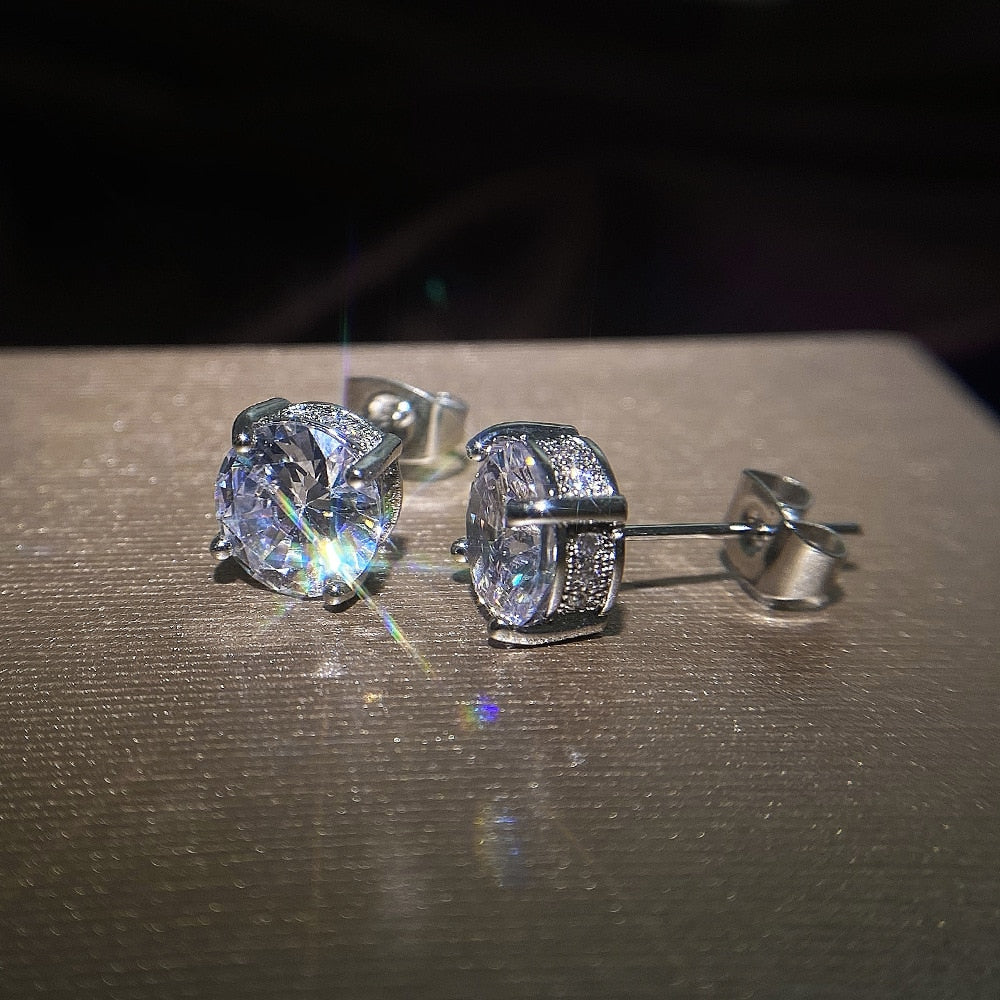 Boucle d'oreille unisexe en argent et zircone, point de lumière