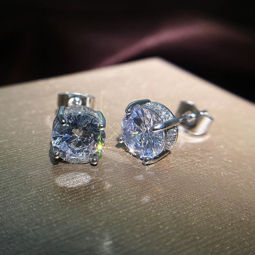 Boucle d'oreille unisexe en argent et zircone, point de lumière