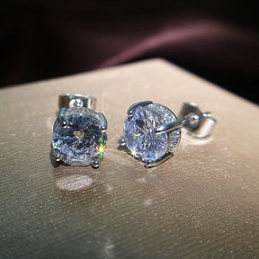 Boucle d'oreille unisexe en argent et zircone, point de lumière